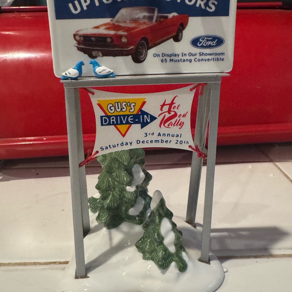 Dept 56 uptown Billboard and 5 cars with Headstone sign All in original box’s.